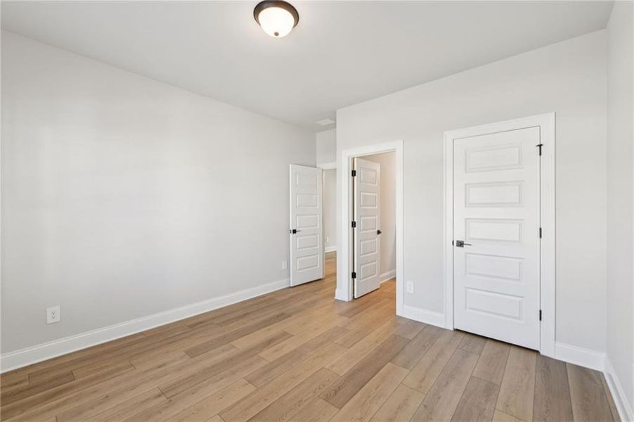 Spacious, unfurnished interior of a new home in Vines at Mill Creek - Estate Series, Braselton (Image 25).