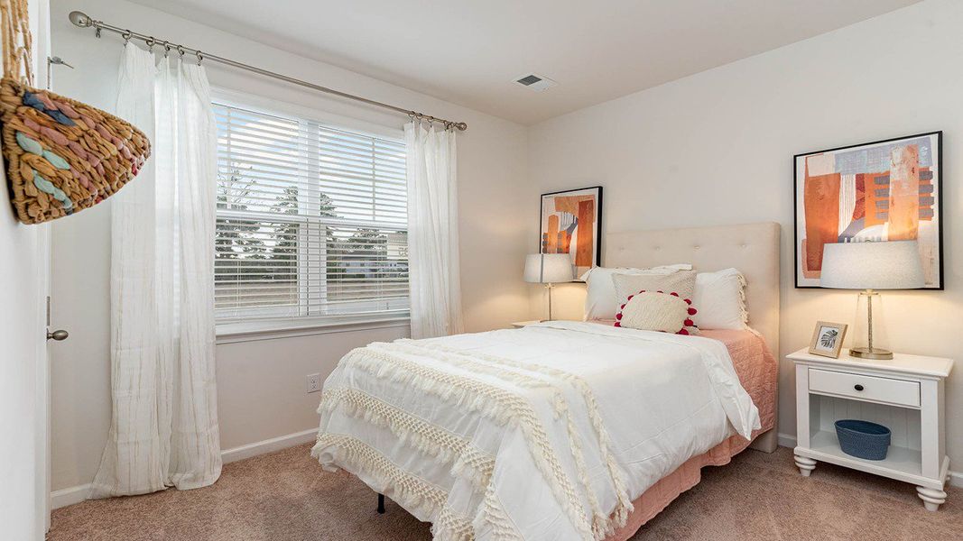 Furnished interior in a model home at South Island landing in Georgetown (Image 31).