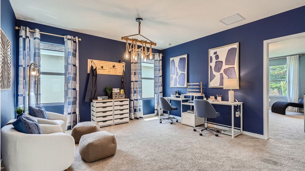 Representative furnished interior of a home built from the Grandcourt by D.R. Horton in Parker Pointe, Homestead (Image 29).