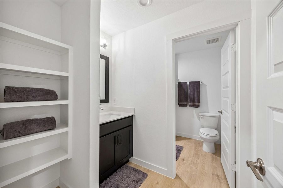 The is the full bathroom that is there for the 3 front bedrooms.