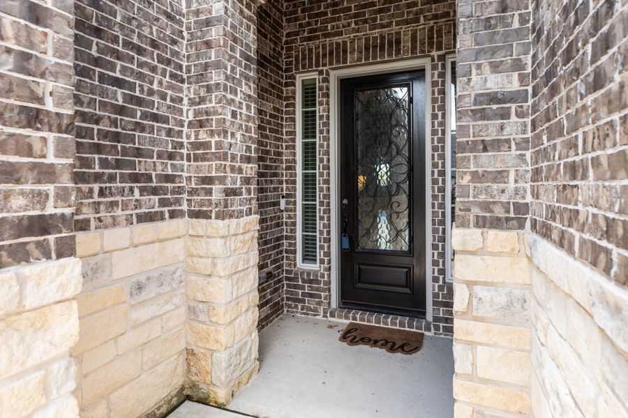 Stunning door made of wood and glass with a stylish metal frame.