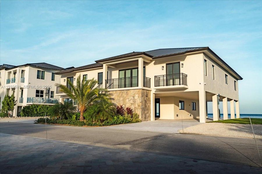 Front exterior of a new home in , Marathon, FL, highlighting curb appeal (Image 31).