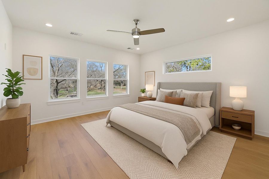 Bedroom with light wood finished floors, recessed lighting, and ceiling fan
