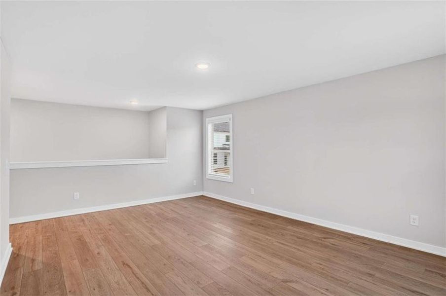 Spacious, unfurnished interior of a new home in The Fairways at Mirror Lake, Villa Rica (Image 25).