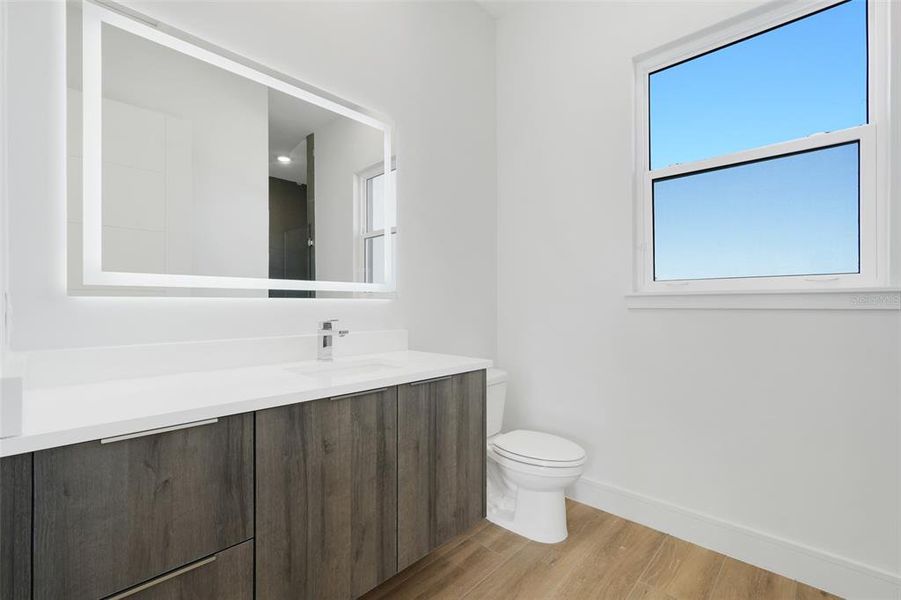 Furnished interior view inside a new home in Hampton Green at Providence, Davenport (Image 14).