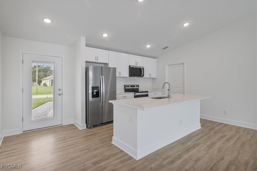 Furnished interior view inside a new home in Cape Coral, Cape Coral (Image 7). Furnished interior view inside a new home in Cape Coral, Cape Coral (Image 7).