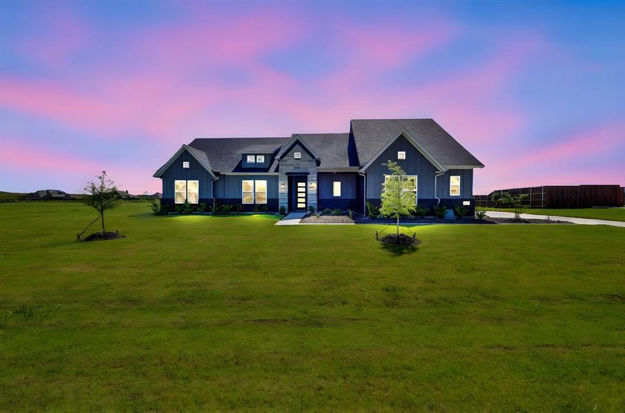 Front exterior of a new home in Springside Estates II, Waxahachie, TX, highlighting curb appeal (Image 2). Front exterior of a new home in Springside Estates II, Waxahachie, TX, highlighting curb appeal (Image 2).
