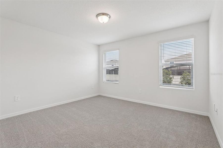 Spacious, unfurnished interior of a new home in Cagan Crossings West, Clermont (Image 26).