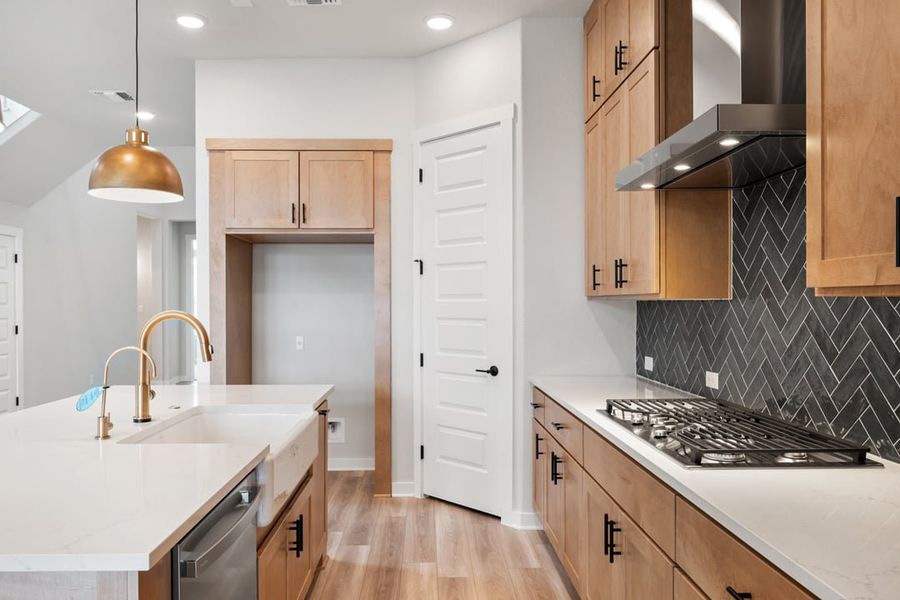 Furnished interior view inside a new home in Arbor Collection at Lariat, Liberty Hill (Image 12). Furnished interior view inside a new home in Arbor Collection at Lariat, Liberty Hill (Image 12).