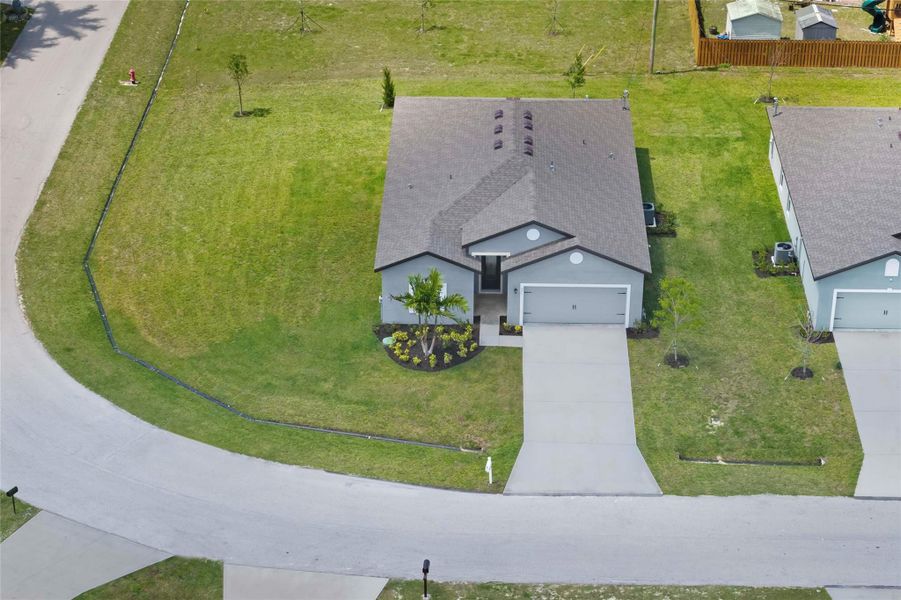 Front exterior of a new home in Port St Lucie, Port St. Lucie, FL, highlighting curb appeal (Image 11).