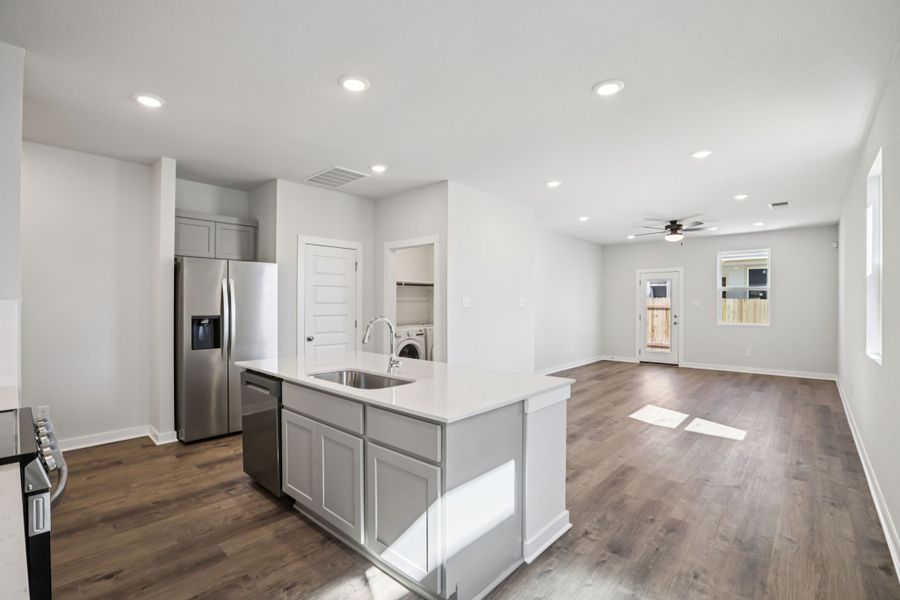 A kitchen with white cabinets. A kitchen with white cabinets.