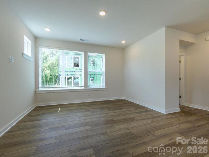 Spacious, unfurnished interior of a new home in Central Living at Craig, Charlotte (Image 18).