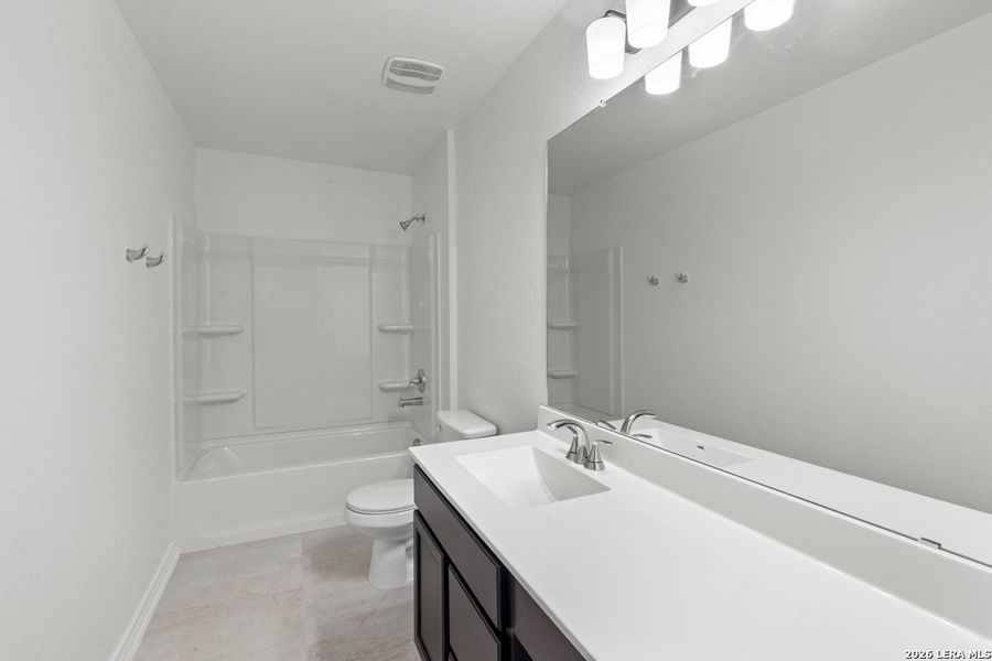 Furnished interior view inside a new home in Hidden Bluffs at TRP, San Antonio (Image 7).