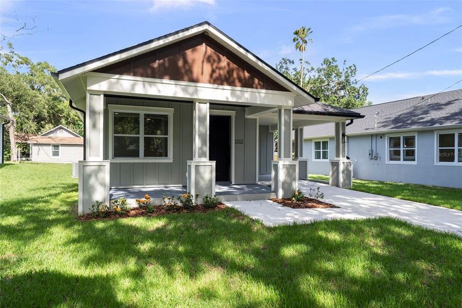 Front exterior of a new home in , Tampa, FL, highlighting curb appeal (Image 22). Front exterior of a new home in , Tampa, FL, highlighting curb appeal (Image 22).