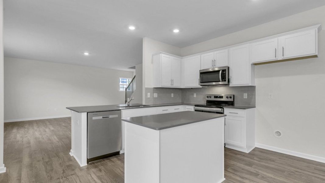 Representative furnished interior of a home built from the WILMINGTON by D.R. Horton in North Gate, Vass (Image 5).