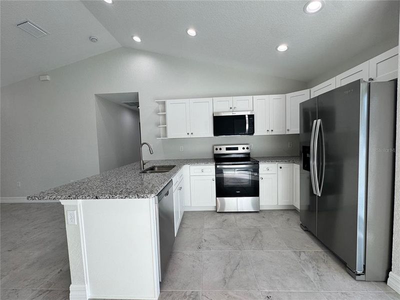 Furnished interior view inside a new home in , Port Charlotte (Image 8).