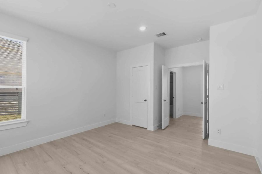Representative unfurnished interior of a home built from the Springfield by Chesmar Homes in Bridgeland, Elgin (Image 21).