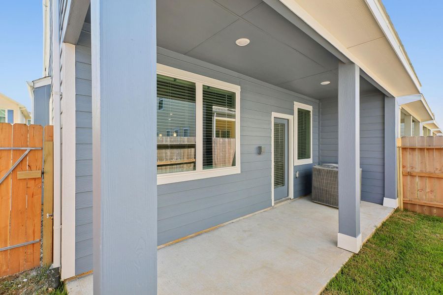 Exterior details and patio area of a home in Kemah Crossing - City Series, Kemah (Image 4). Exterior details and patio area of a home in Kemah Crossing - City Series, Kemah (Image 4).