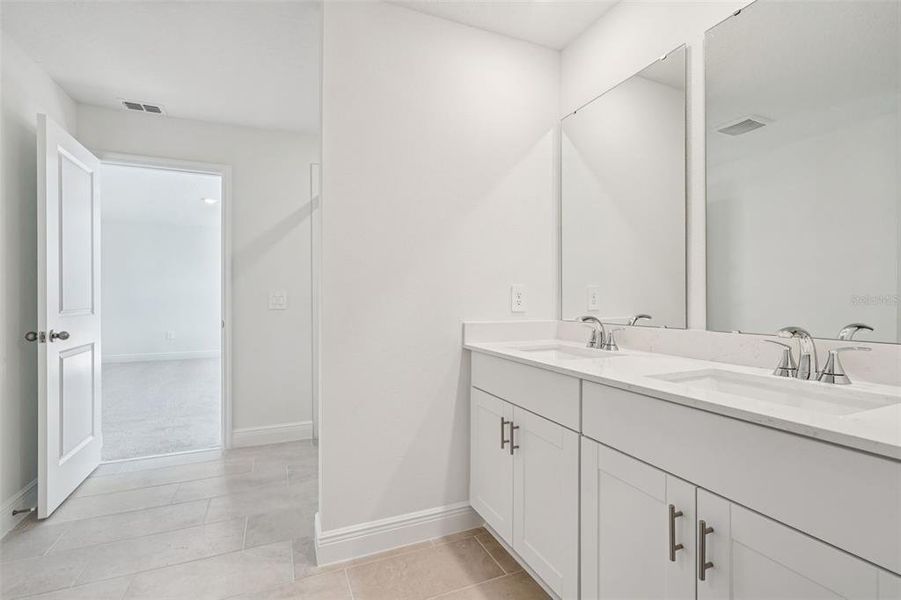 Furnished interior view inside a new home in The Reserve at Hammock Oaks - Signature Series, Lady Lake (Image 9).