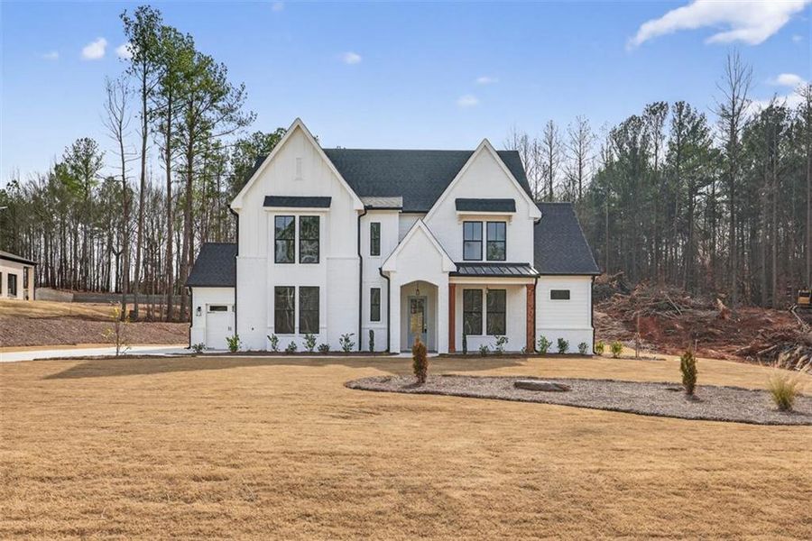 Front exterior of a new home in , Jefferson, GA, highlighting curb appeal (Image 28).
