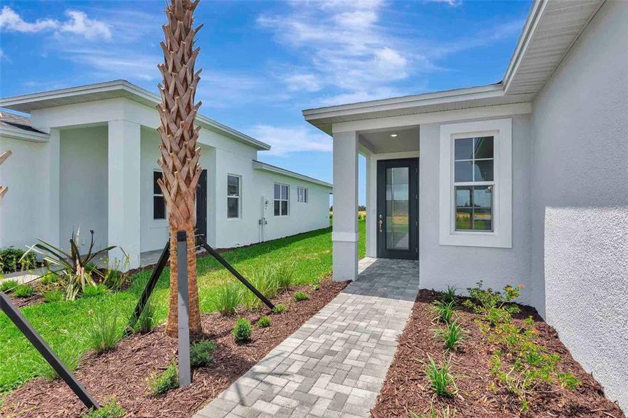 Exterior details and patio area of a home in Cresswind at Lake Harris, Tavares (Image 4).