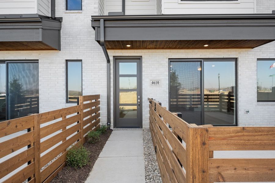 Exterior details and patio area of a home in Wildridge, Oak Point (Image 3).