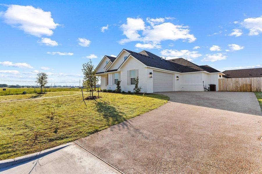 Front exterior of a new home in , Robinson, TX, highlighting curb appeal (Image 23). Front exterior of a new home in , Robinson, TX, highlighting curb appeal (Image 23).