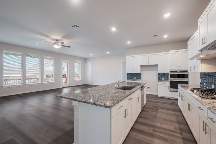 Representative furnished interior of a home built from the Englewood by Scott Felder Homes in Prominence, San Antonio (Image 7).