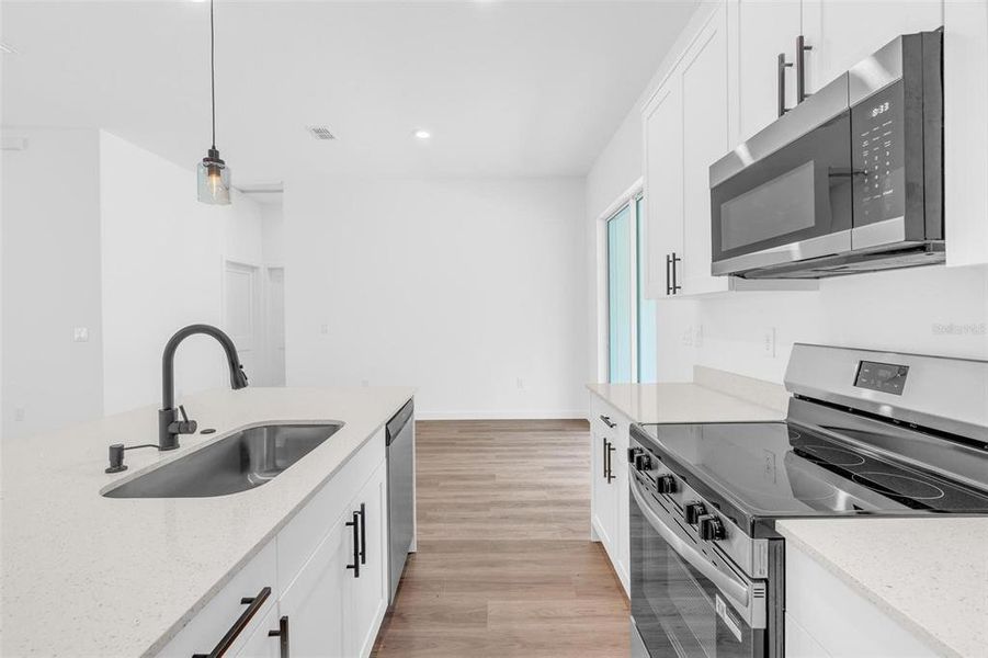 Furnished interior view inside a new home in , Dunnellon (Image 15).