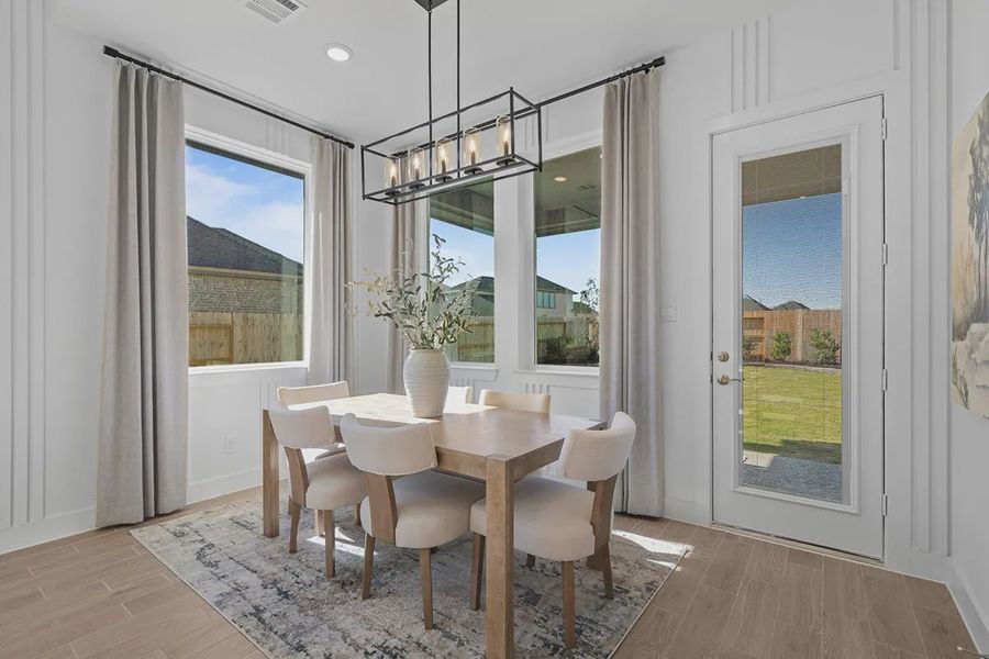 Representative furnished interior of a home built from the Bonneville by Chesmar Homes in Grange, Katy (Image 11).