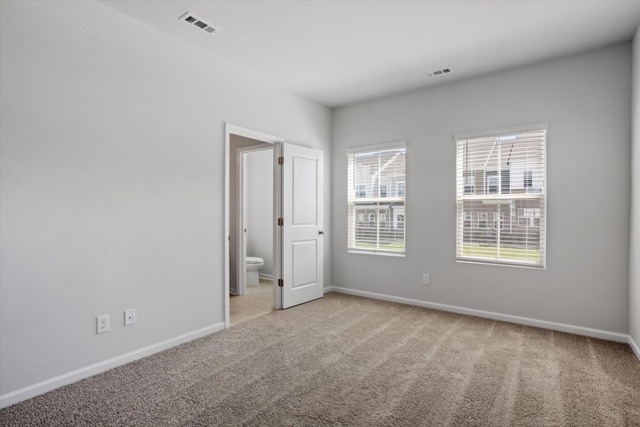 Spacious, unfurnished interior of a new home in Renaissance at White Oak, Garner (Image 16).