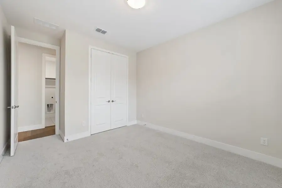 Representative unfurnished interior of a home built from the Delaney by Landon Homes in Lexington Frisco, Frisco (Image 27).