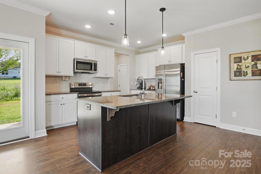 Furnished interior view inside a new home in , Monroe (Image 12).