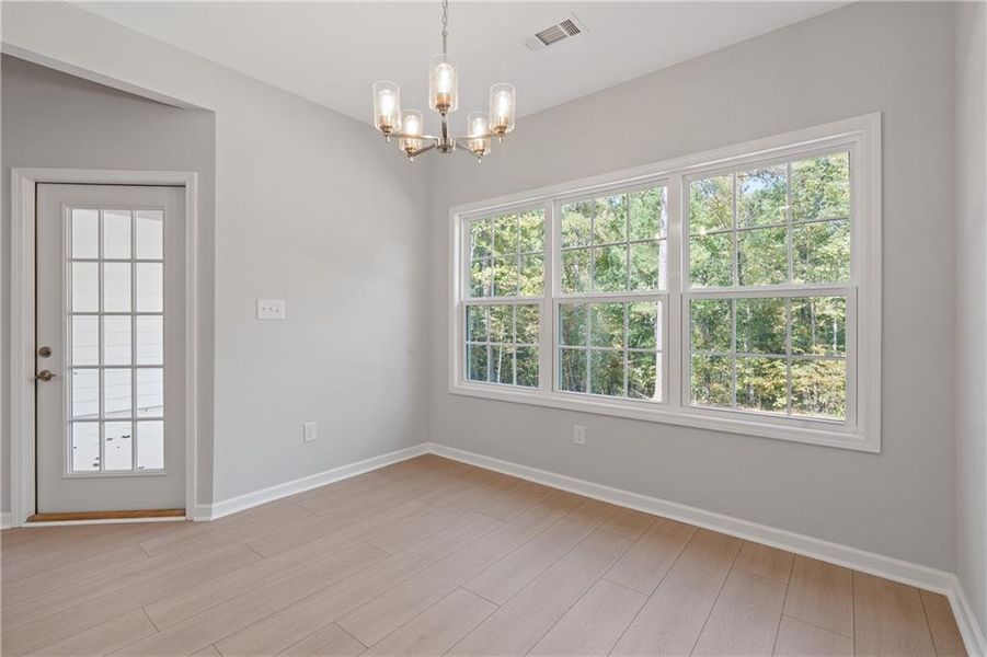 Spacious, unfurnished interior of a new home in , Gray (Image 48).