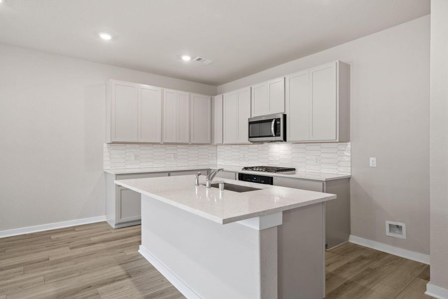 Furnished interior view inside a new home in Westridge Cove, Conroe (Image 7).