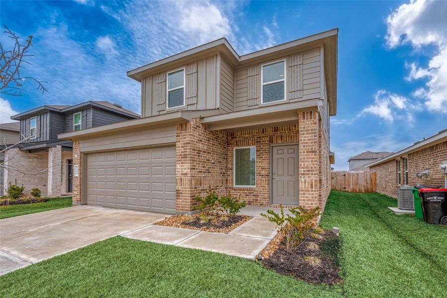 Front exterior of a new home in Breckenridge Forest, Spring, TX, highlighting curb appeal (Image 23).