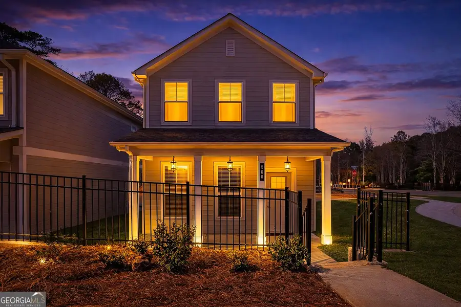 Front exterior of a new home in The Cottages at East Lanier, Fayetteville, GA, highlighting curb appeal (Image 2). Front exterior of a new home in The Cottages at East Lanier, Fayetteville, GA, highlighting curb appeal (Image 2).