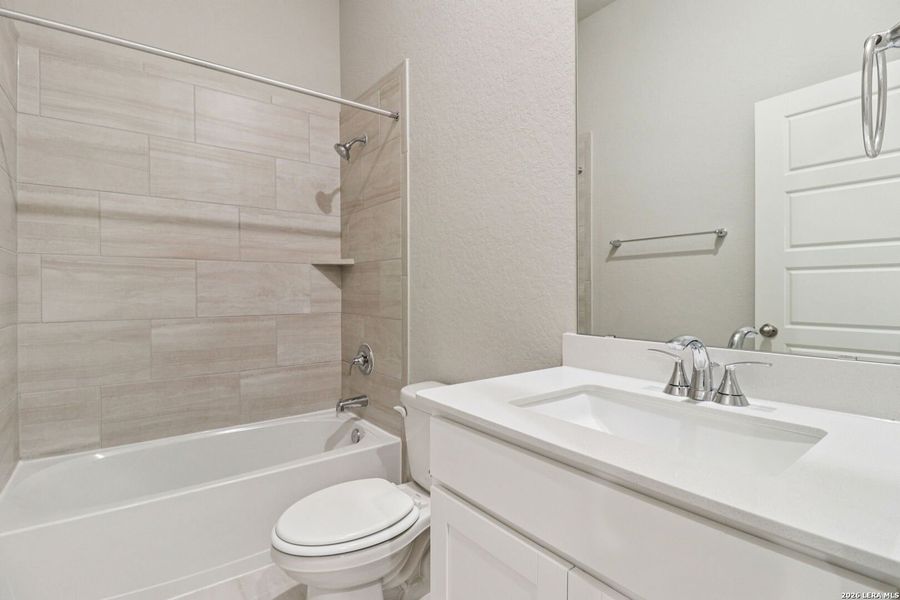 Furnished interior view inside a new home in Estancia Ranch - Classic Series, San Antonio (Image 9).