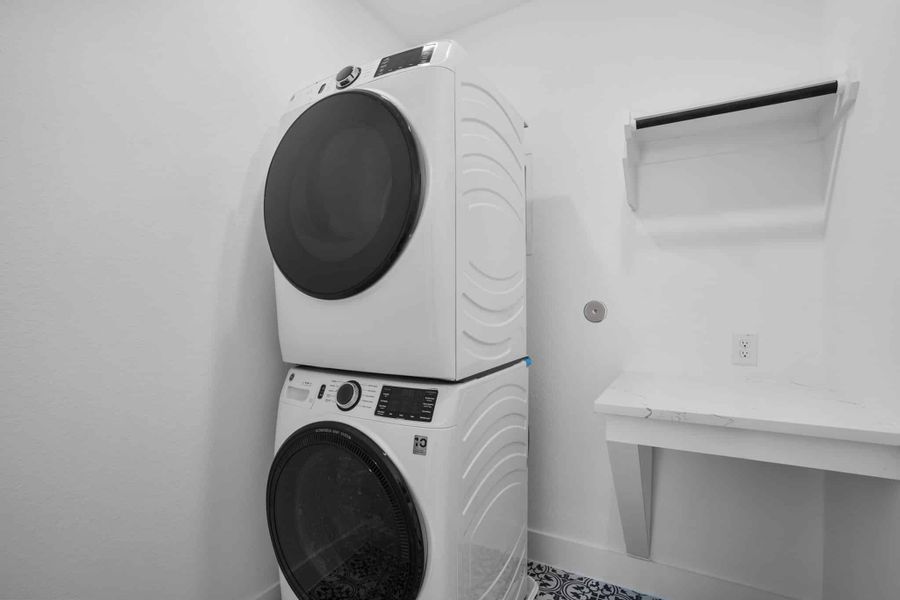 Furnished interior view inside a new home in Meridiana, Manvel (Image 9).