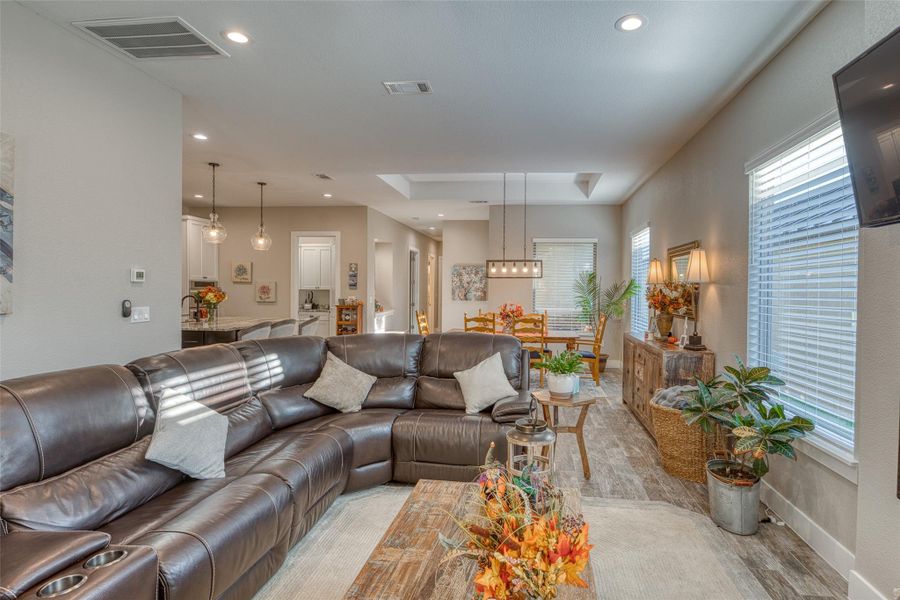 Living area featuring recessed lighting and baseboards