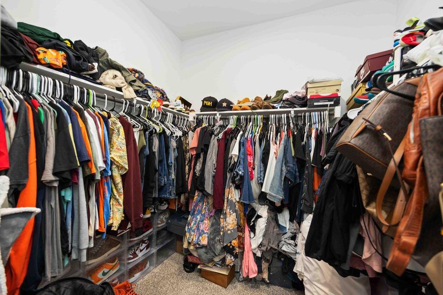 Large walk-in closet Large walk-in closet