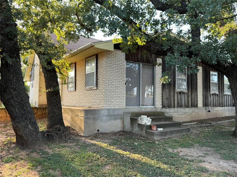 Front exterior of a new home in , Mineral Wells, TX, highlighting curb appeal (Image 18). Front exterior of a new home in , Mineral Wells, TX, highlighting curb appeal (Image 18).