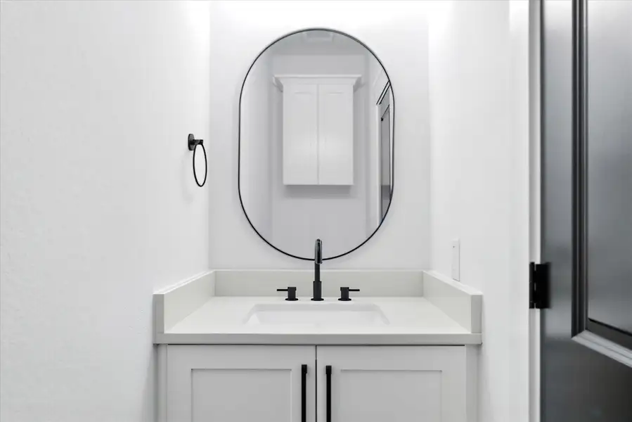 Powder bath located on the first floor. Guests no longer have to use your personal bathroom!