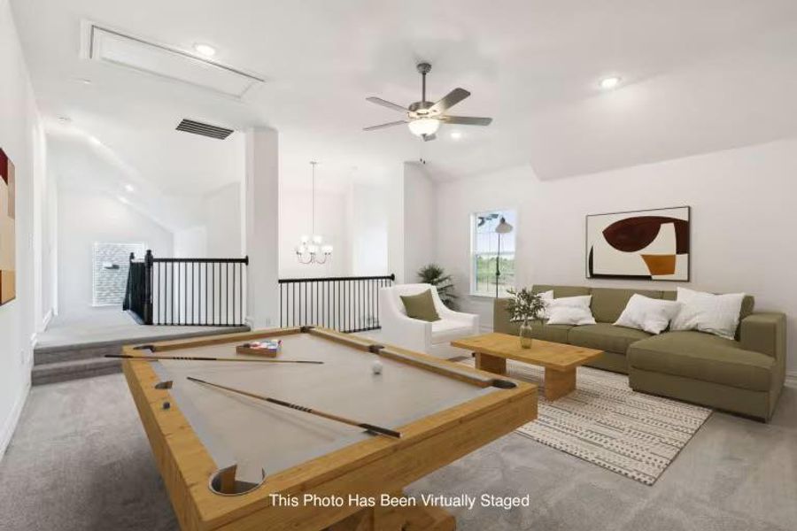 Photo of Pulte model home with same floor plan, not of actual home listed. Photo of Pulte model home with same floor plan, not of actual home listed.