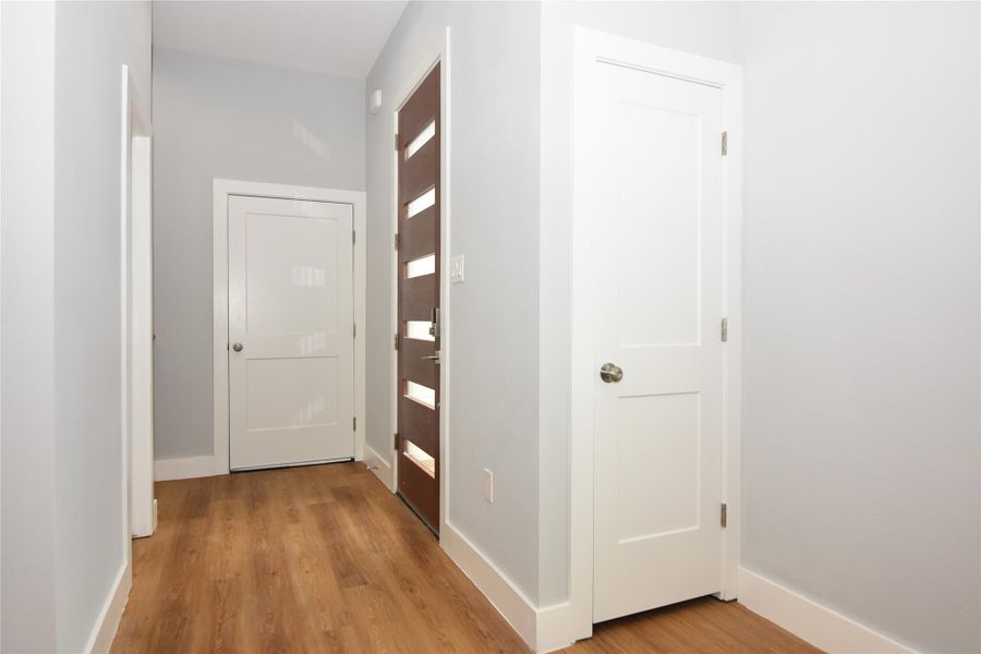 Front door entrance into foyer area Front door entrance into foyer area