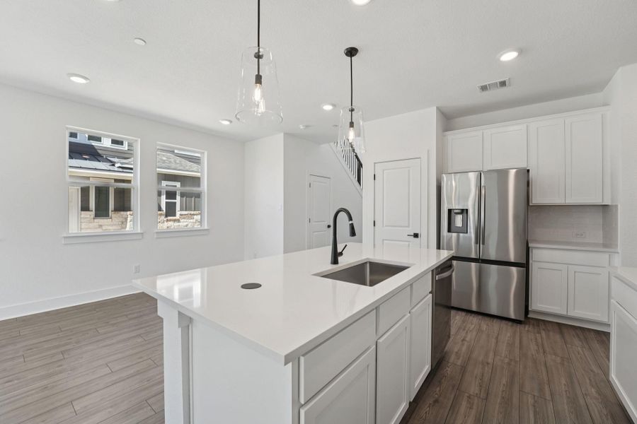 Furnished interior view inside a new home in Avery Centre, Round Rock (Image 3).