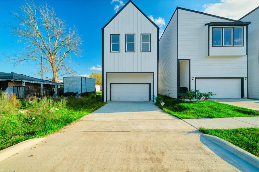 Front exterior of a new home in , Houston, TX, highlighting curb appeal (Image 20).