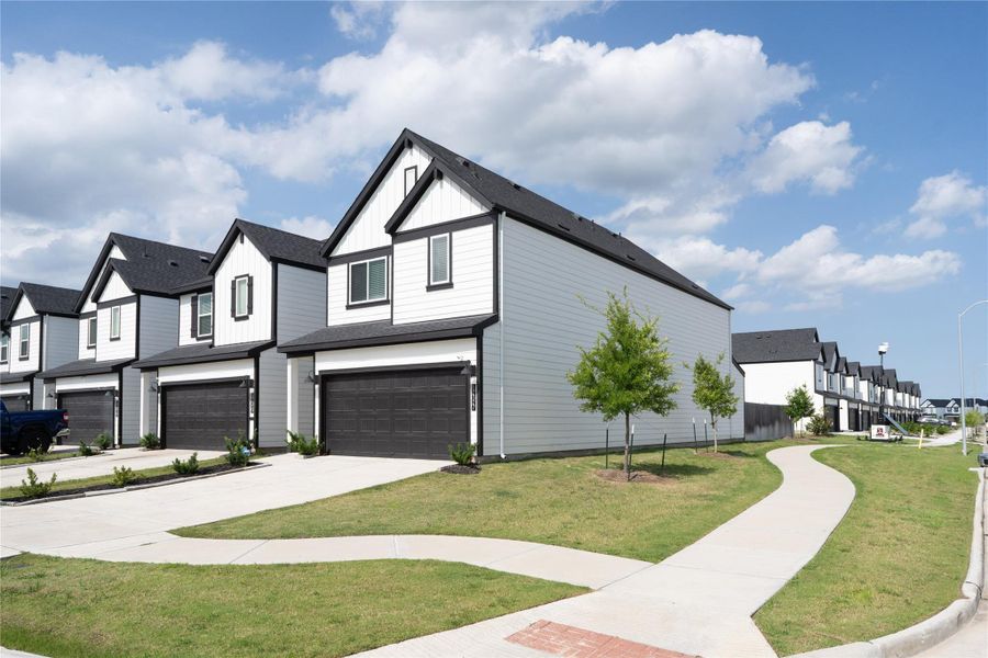 Front exterior of a new home in City Gate, Houston, TX, highlighting curb appeal (Image 2).