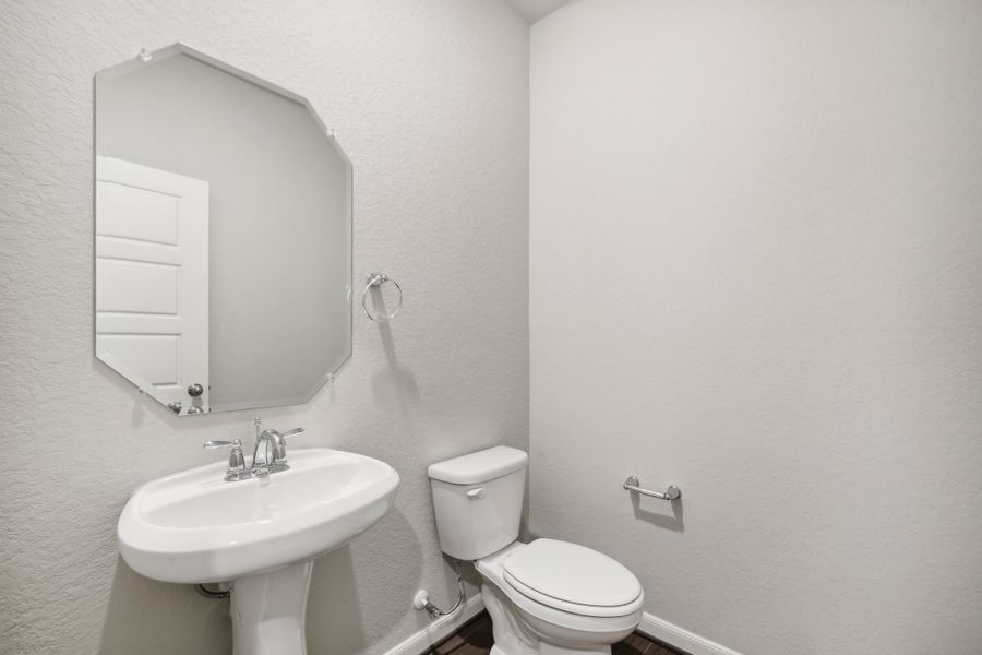 Powder room in the Fitzhugh floorplan in a Meritage Homes community.