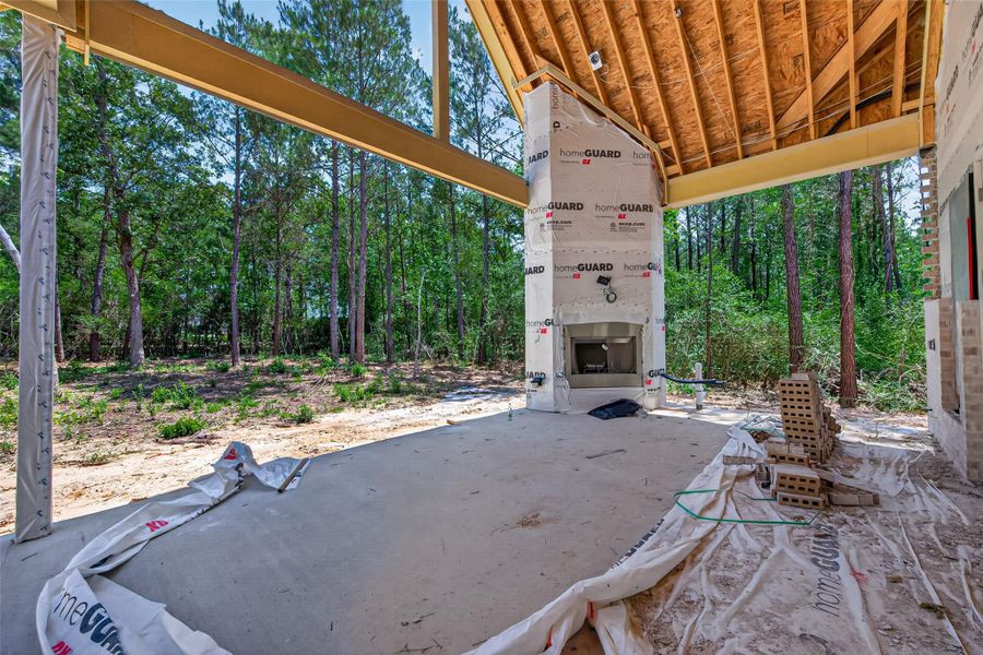 Outdoor kitchen will be to the right of the fireplace